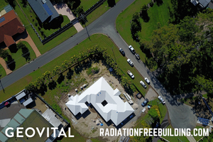 Overhead view of corner property near two power lines with magnetic fields