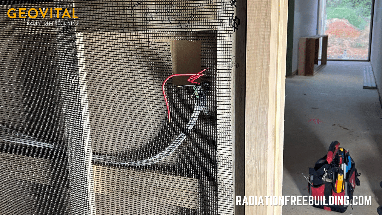 Opening for the power outlet left in GPA shielding mesh in EMF protected house